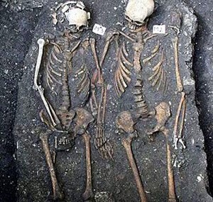 skeletons holding hands