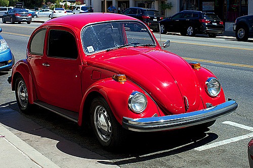 red volkswagen shiny car