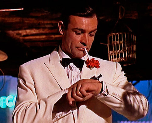 james bond sean connery looking at watch