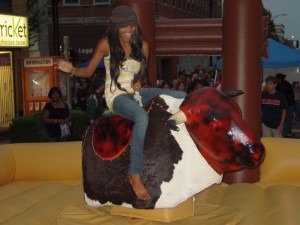 Mechanical Bull girl black hat