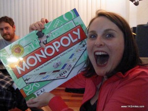 Monopoly game with excited girl