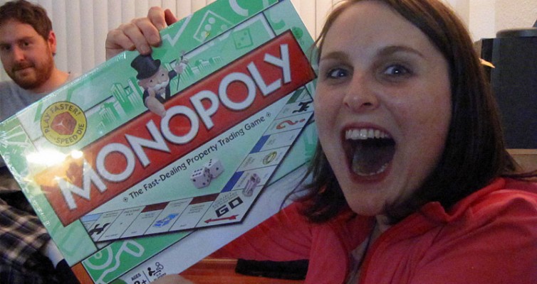 Monopoly game with excited girl